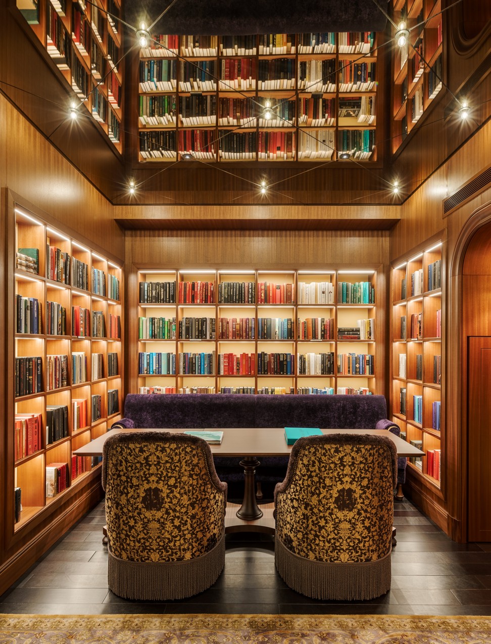 Cook & Tras Social Library features more than 3,000 books to peruse as you dine. Photo: Six Senses
