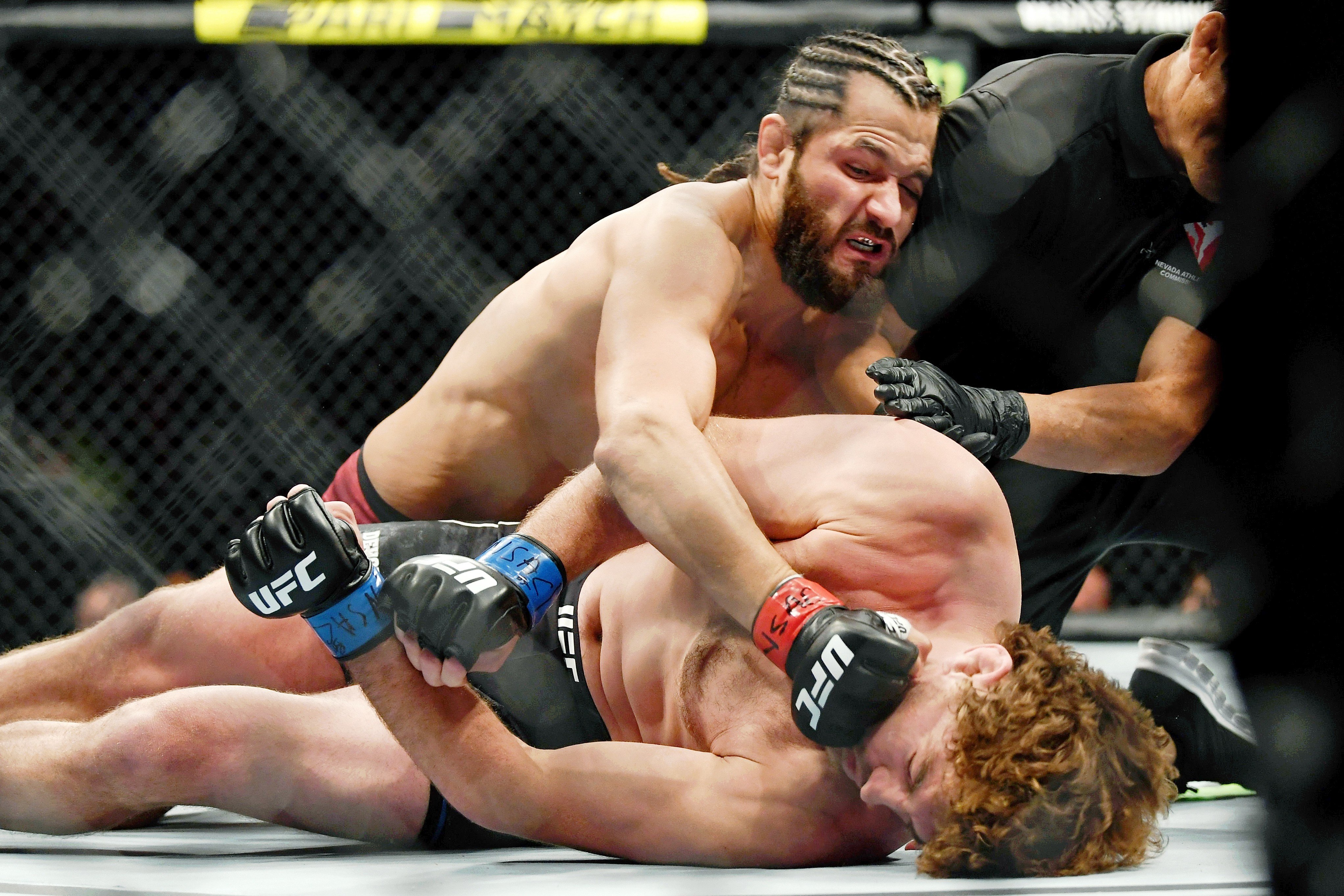 Jorge Masvidal punches Ben Askren as referee Jason Herzog stops the fight at T-Mobile Arena. Photo: USA TODAY Sports