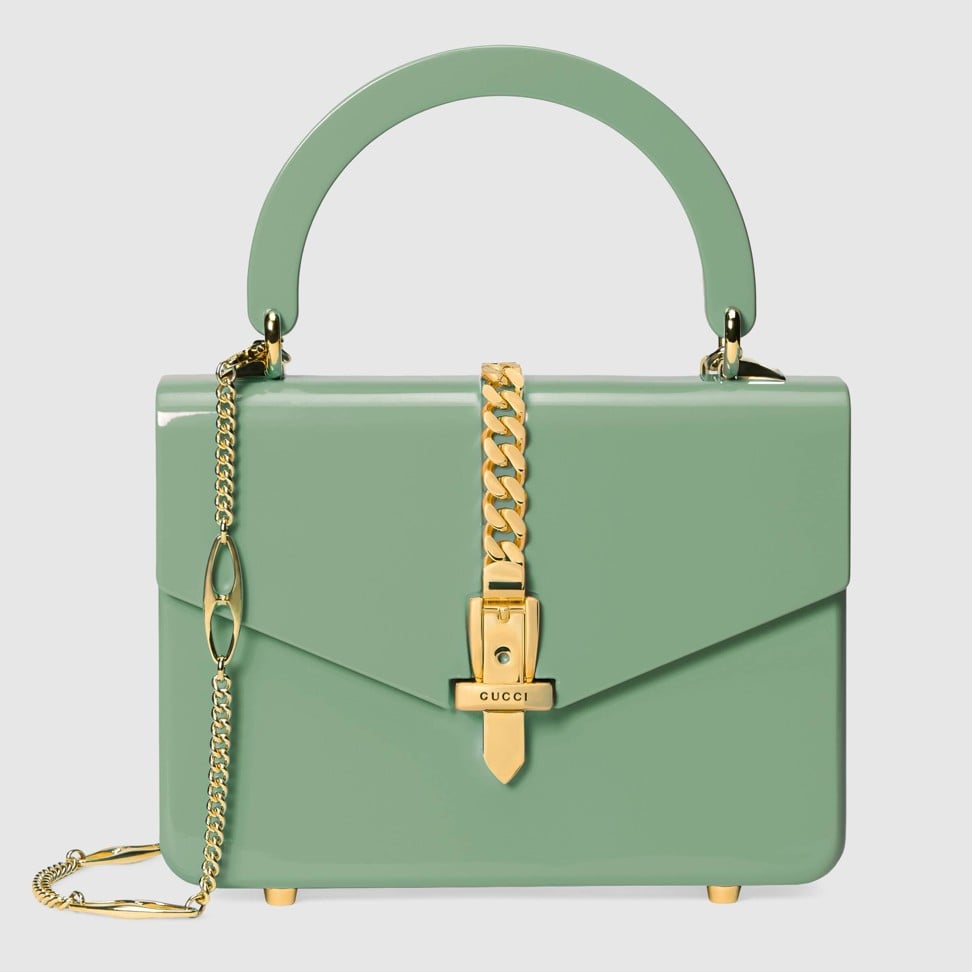Gucci’s Sylvie 1969 mini bag, made from sage green plexiglas, exudes the youthful spirit that the new Gucci gang channels.