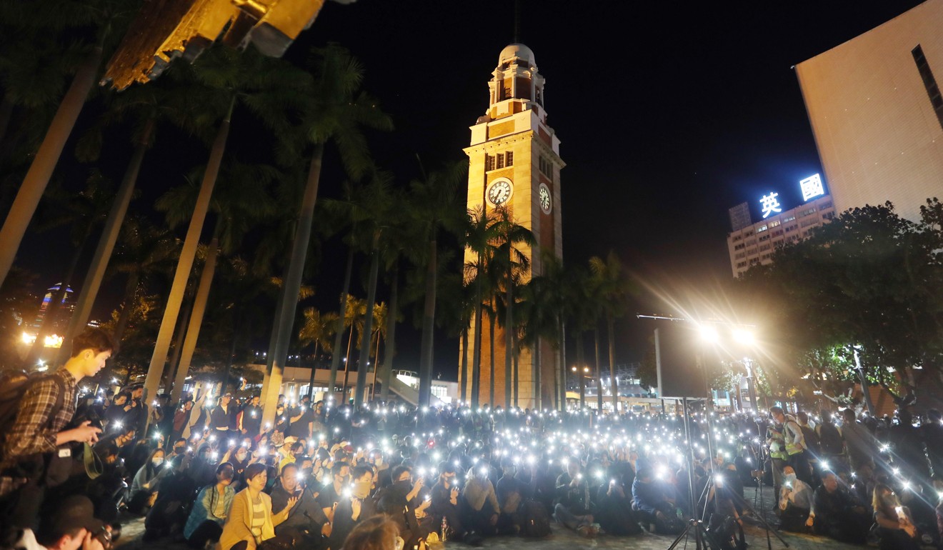 About 3,000 protesters gathered at the clock tower in Tsim Sha Tsui on Thursday to show support for the radicals who were placed under police siege at PolyU. Photo: Xiaomei Chen