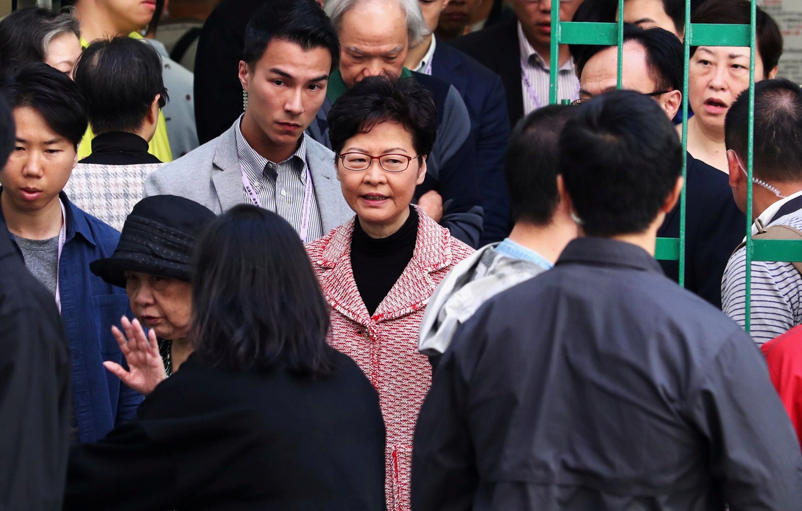 Hong Kong Chief Executive Carrie Lam leaves after voting at a polling station during the district council elections on November 24. Photo: Reuters