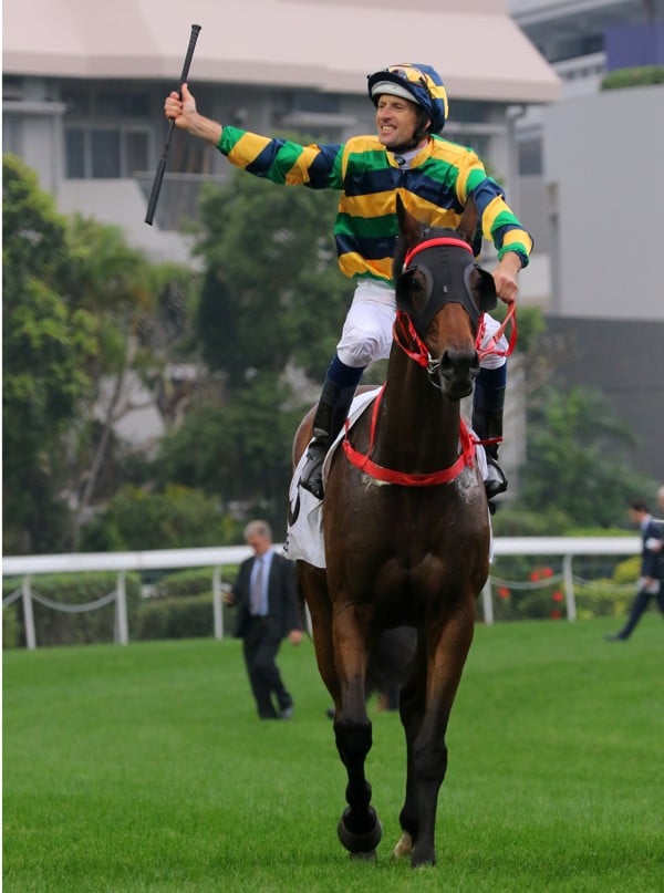 Hugh Bowman celebrates Furore’s Hong Kong Derby win.