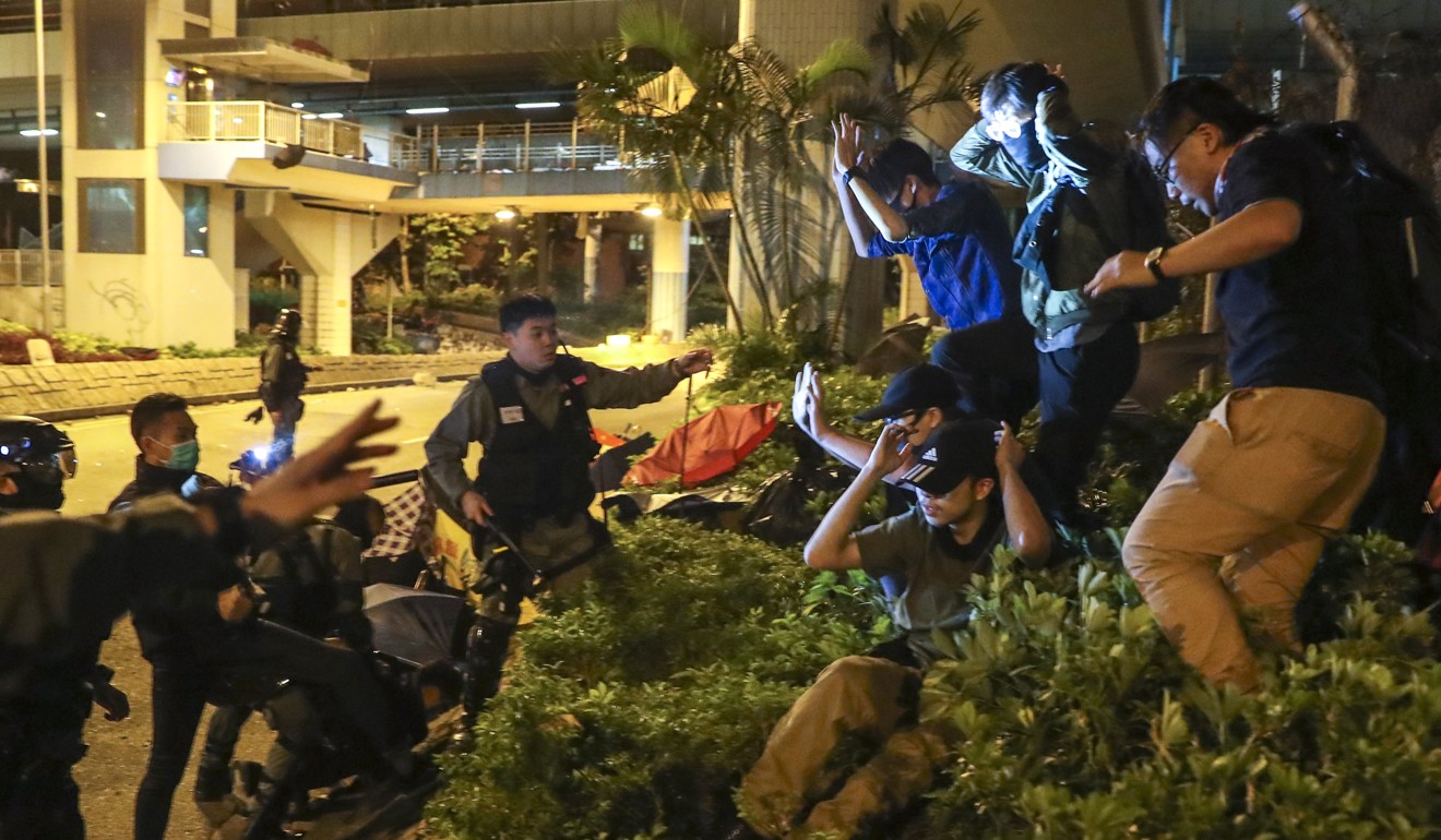 Protesters face arrest while trying to escape from Polytechnic University campus on November 19. Photo: Sam Tsang