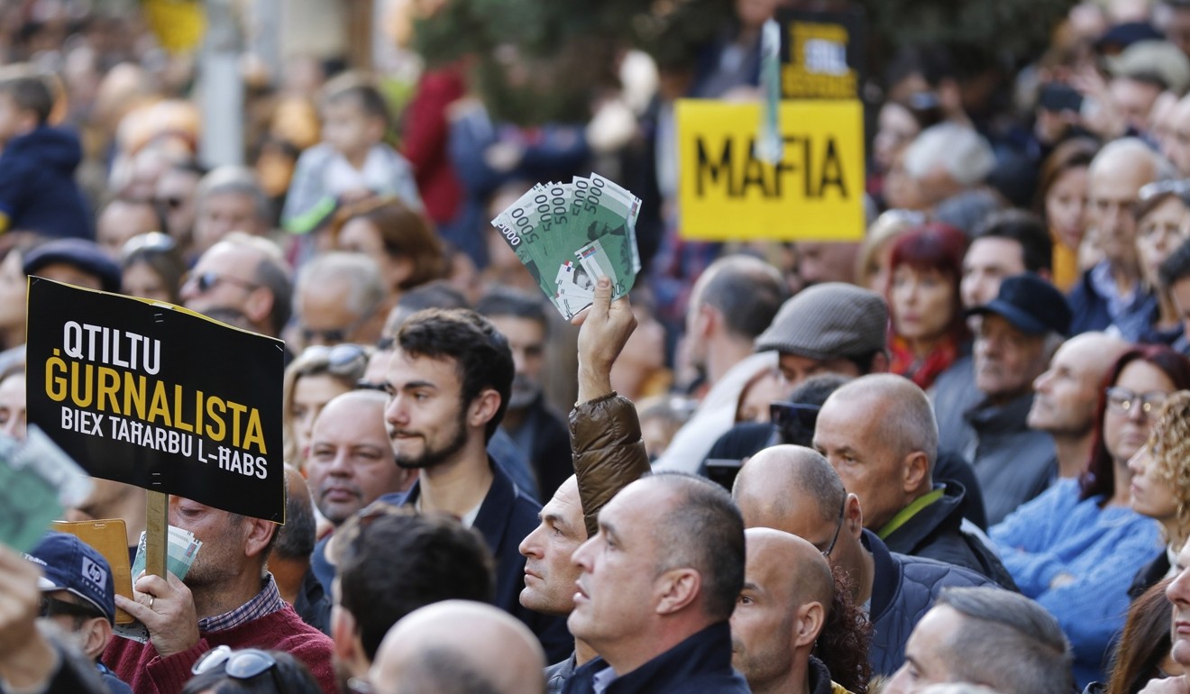 People stage a protest in La Valletta. Photo: AP Photo