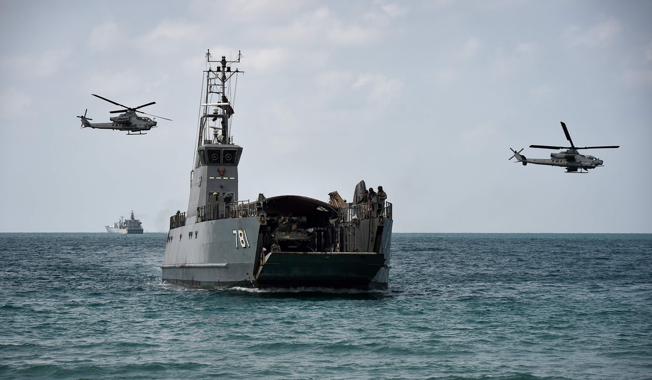 US and Thai soldiers approach the beach during an amphibious landing in Chonburi. Photo: AFP