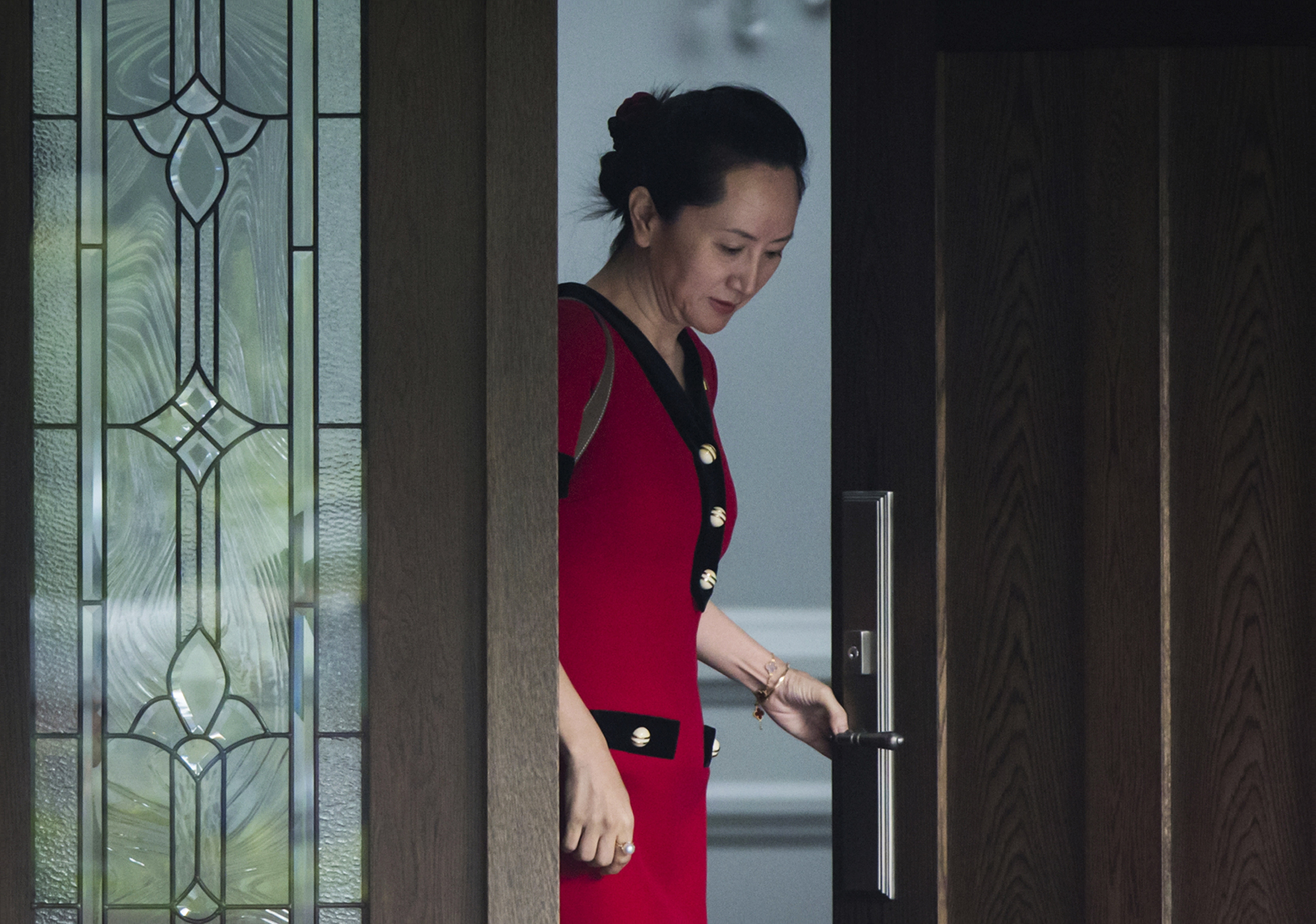 Huawei chief financial officer Meng Wanzhou leaves her home to attend a court hearing in Vancouver in October. Photo: The Canadian Press via AP