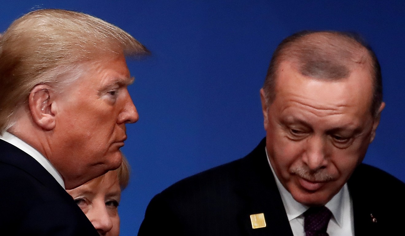 US President Donald Trump, German Chancellor Angela Merkel and Turkish President Tayyip Erdogan are seen at the Nato summit. Photo: Reuters