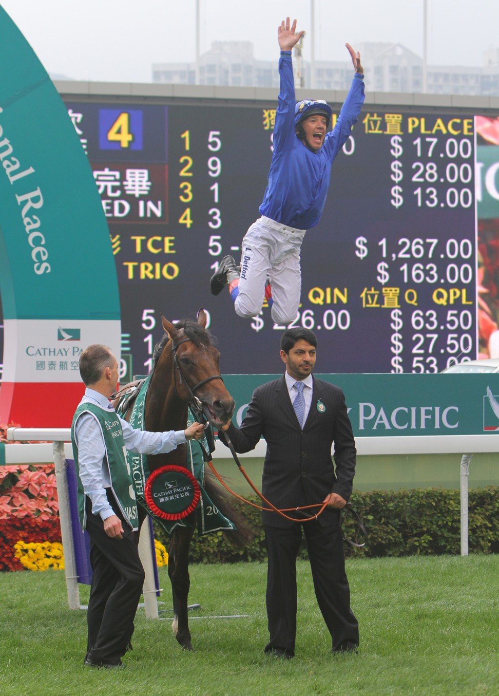 Frankie Dettori with his famous flying at Sha Tin in 2010.