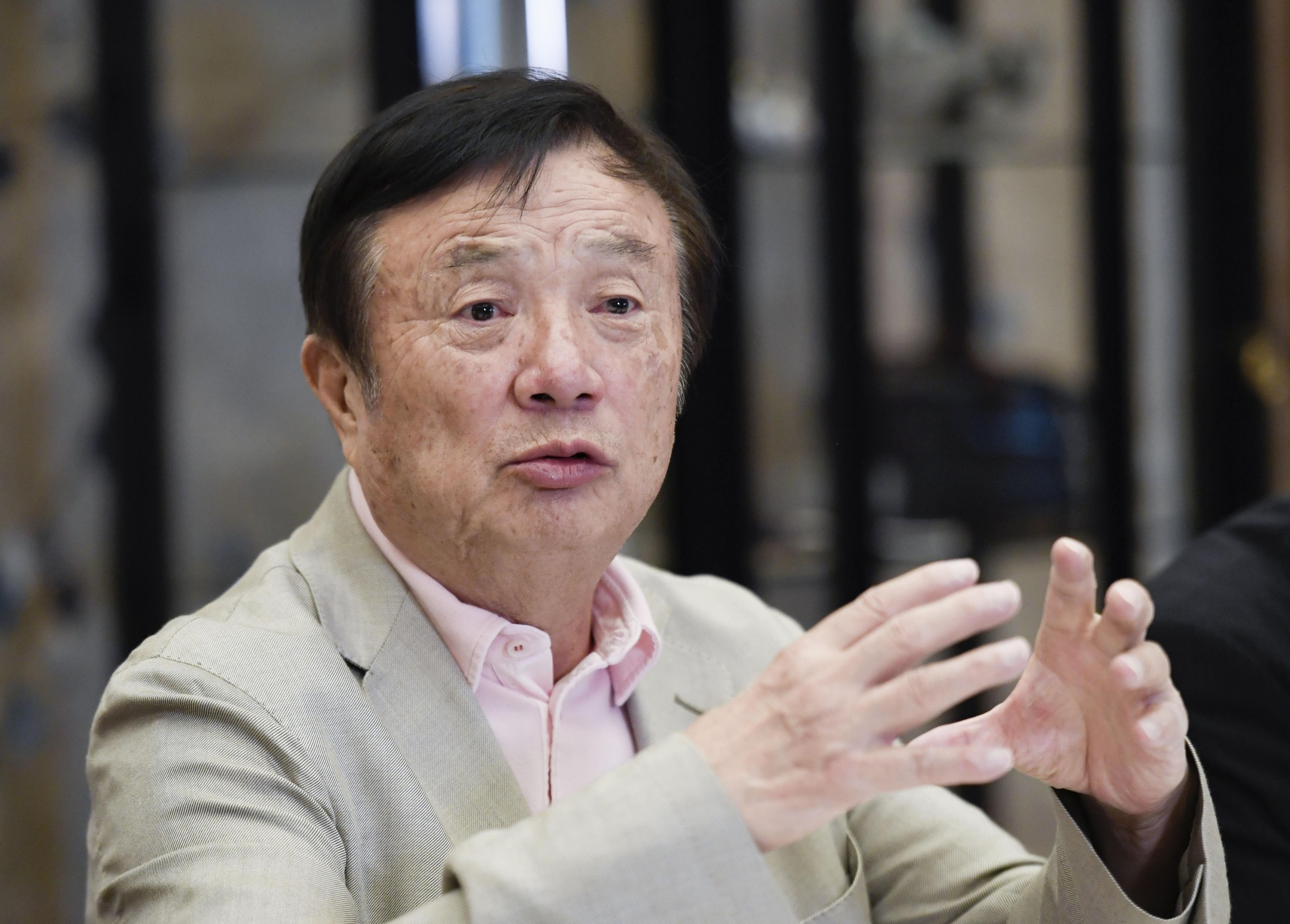Huawei founder Ren Zhengfei says the company will shift its focus of development towards Canada. Photo: Kyodo