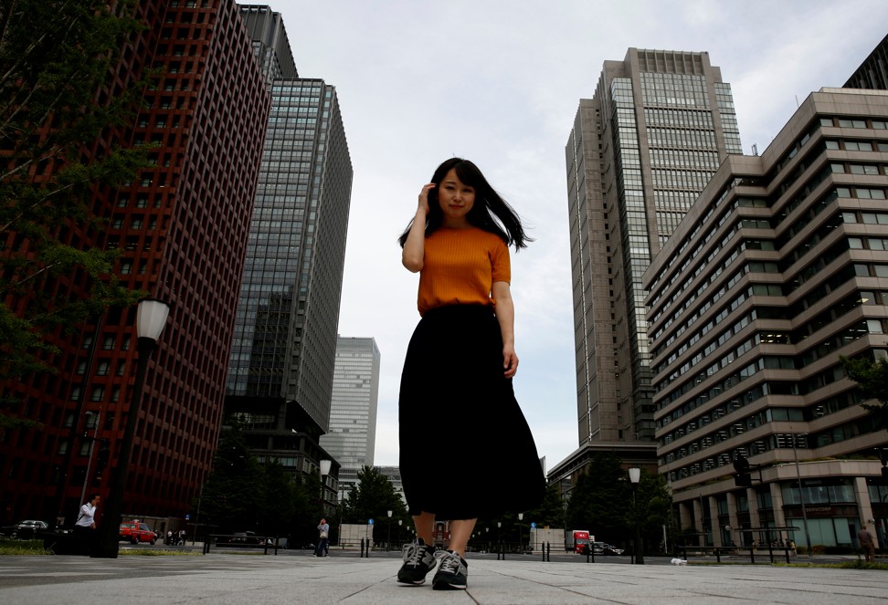 Japan opponent of mandatory high heels at work fights glasses ban for ...