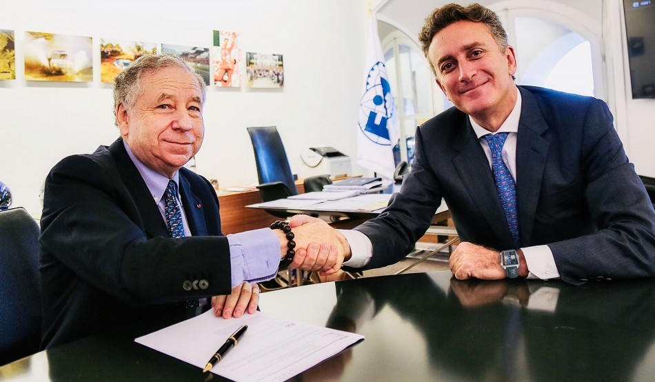 FIA chief Jean Todt and Formula E boss Alejandro Agag shake hands after signing the world championship agreement in Paris. Photo: FIA