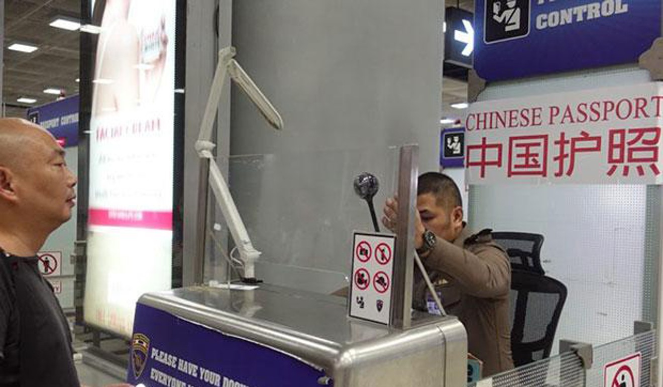 A traveller waits for his documents to be checked at Bangkok’s Suvarnabhumi airport. Photo: Facebook