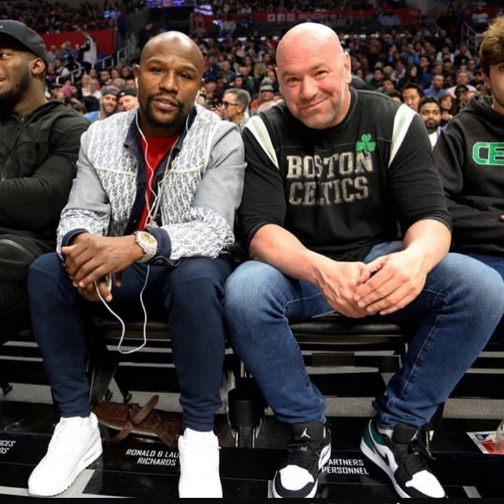 Floyd Mayweather sits with Dana White at an NBA game between the Los Angeles Clippers and the Boston Celtics. Photo: Instagram