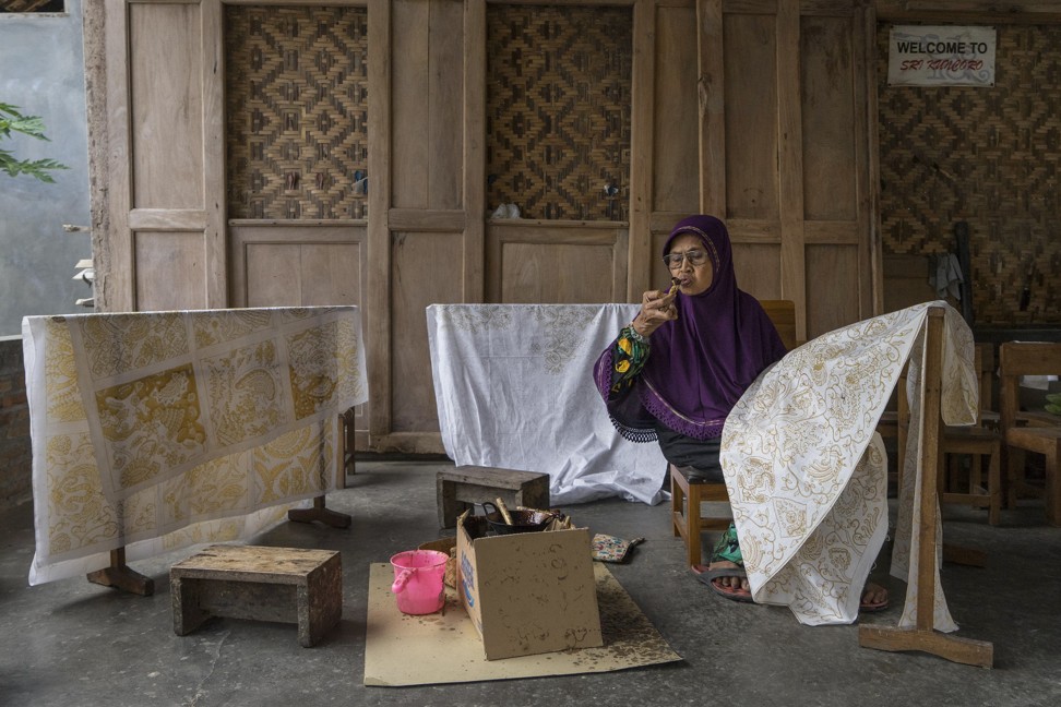 Batik maker Sitinah hard at work in Yogyakarta. Photo: Hendra Nurdiyansyah