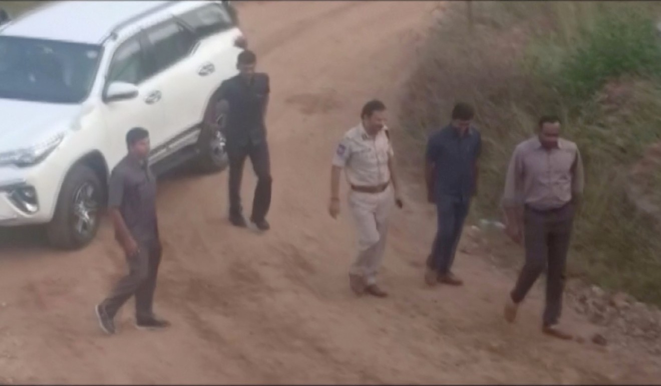 A still frame from a video showing police arriving at the spot where the four men suspected of raping a veterinary surgeon were shot dead in Hyderabad. Photo: Reuters