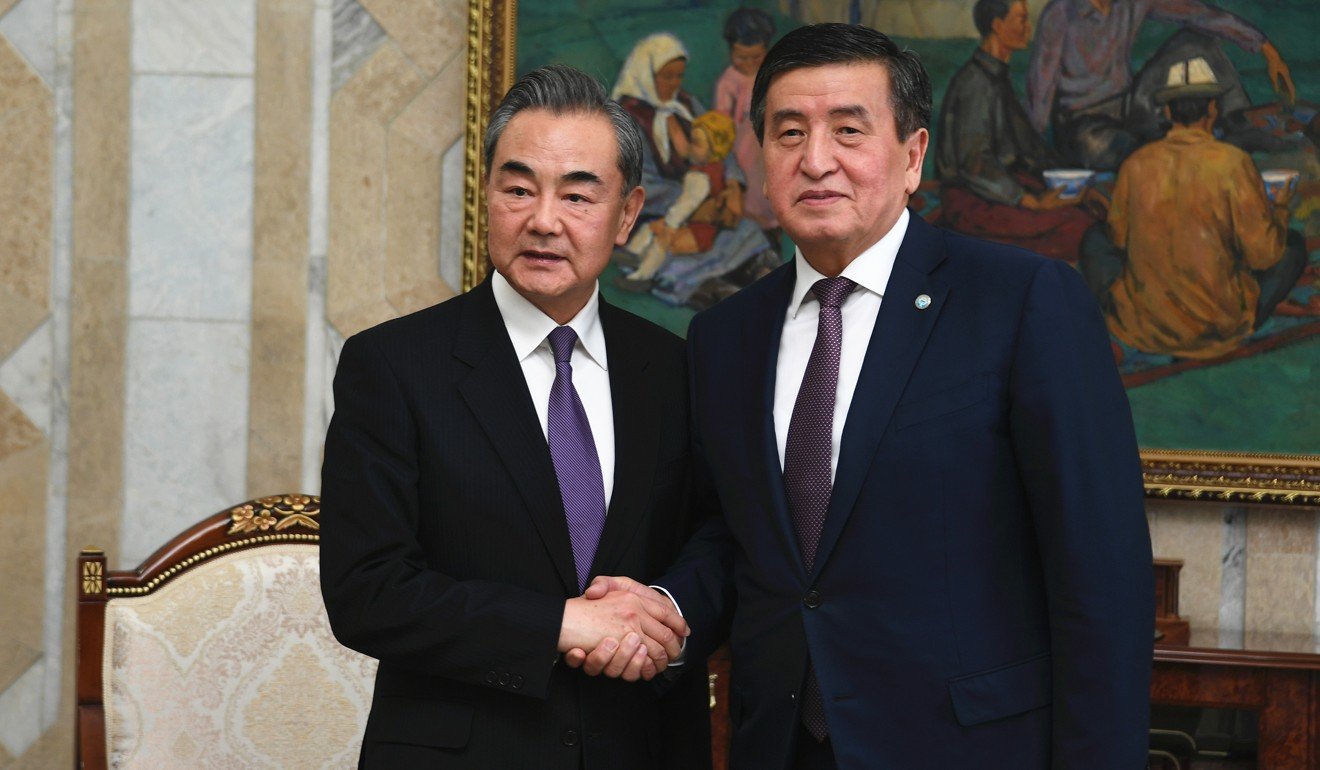 Kyrgyz President Sooronbai Jeenbekov (right) meets Chinese Foreign Minister Wang Yi in Bishkek, Kyrgyzstan, in May. Photo: Xinhua