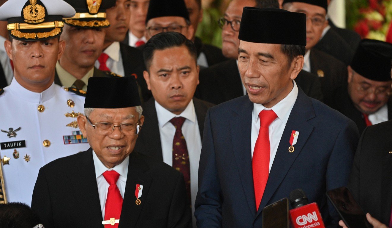 Indonesian President Joko Widodo with Vice-President Ma’ruf Amin, left. Photo: EPA