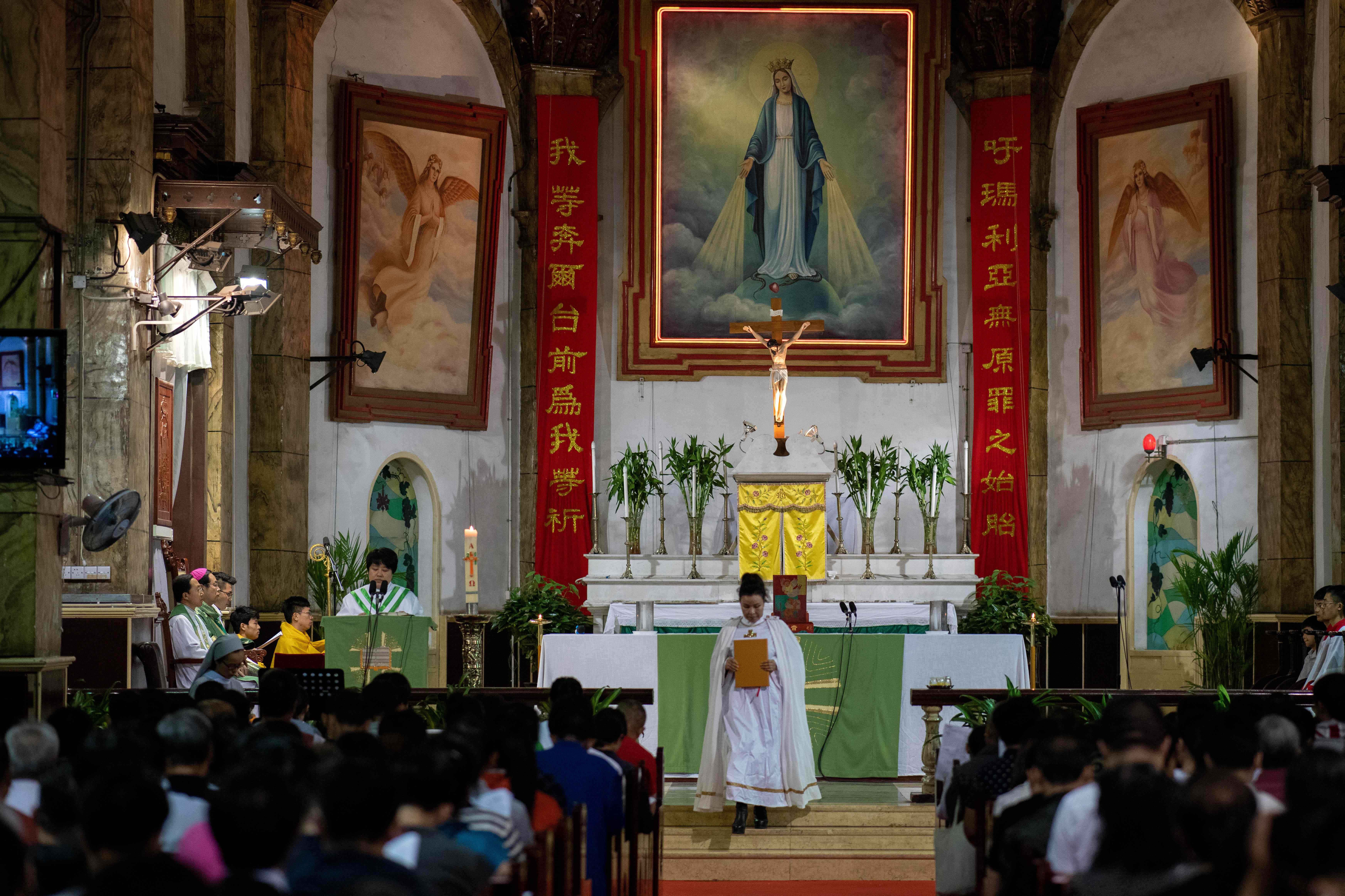 The faithful attend Mass at the South Cathedral in Beijing. Photo: AFP