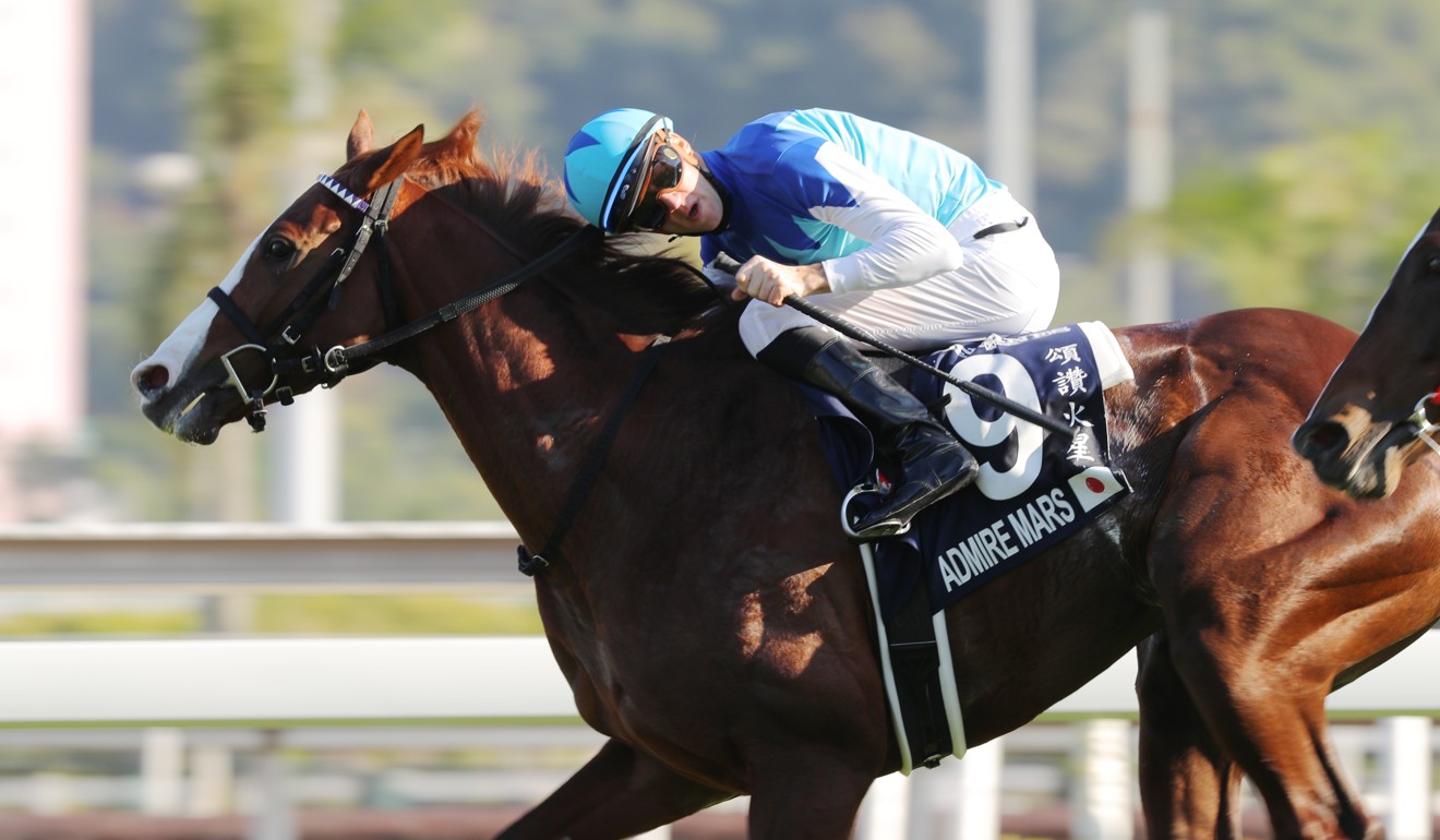 Christophe Soumillon celebrates as he crosses the line.