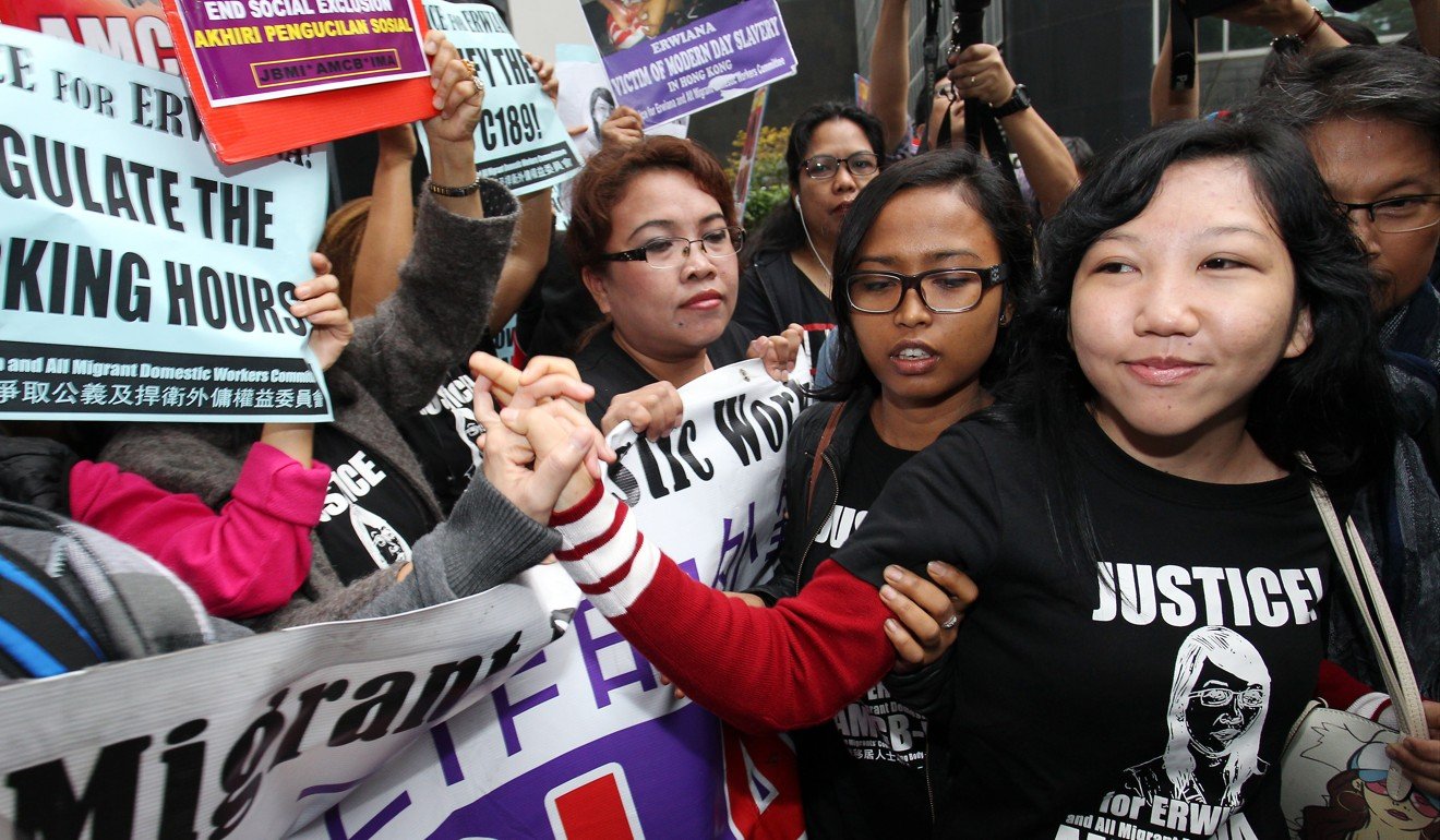 Indonesian domestic worker Erwiana Sulistyaningsih with supporters outside Wan Chai District Court following the sentencing of her former employer Law Wan-tung. Photo: Dickson Lee