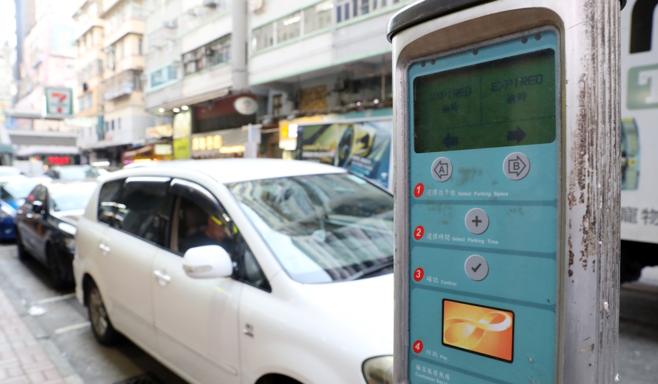 A parking meter in Hong Kong shows an overstayed vehicle. But there are fewer traffic wardens and officers taking action because of the protests, says a force insider. Photo: Dickson Lee
