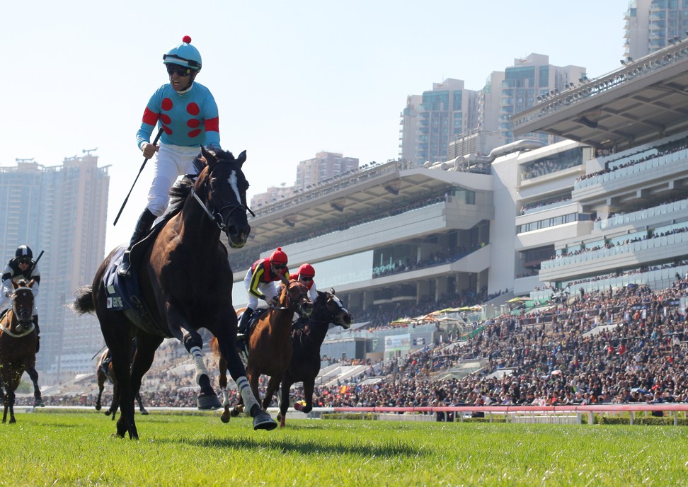 Joao Moreira salutes as he crosses the line on Glory Vase.