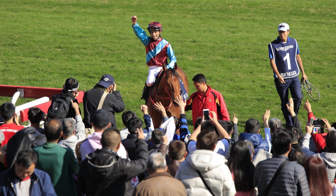 Joao Moreira salutes the crowd.