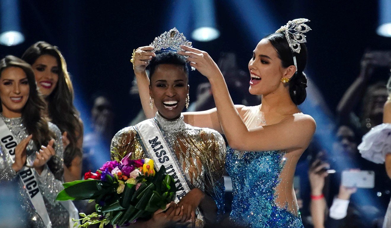 Zozibini Tunzi, of South Africa, is crowned Miss Universe by her predecessor, Catriona Gray of the Philippines. Photo: Reuters