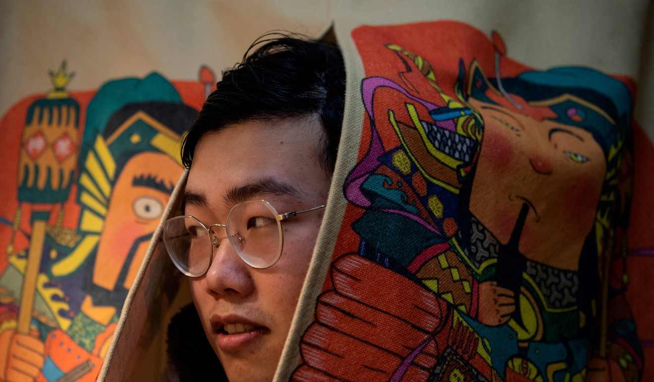 “Virtual boyfriend” Zhuansun Xu poses for a portrait in his room in Beijing. “While we’re interacting, I tell myself: I really am her boyfriend, so how can I treat her well?” he says. Photo: AFP