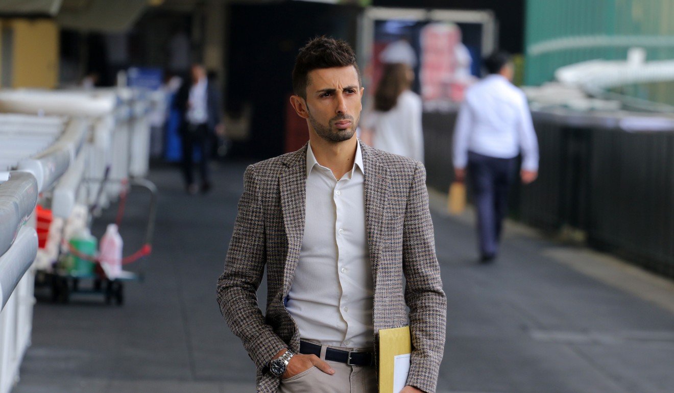 Jockey Alberto Sanna walks into his inquiry at Happy Valley last month.