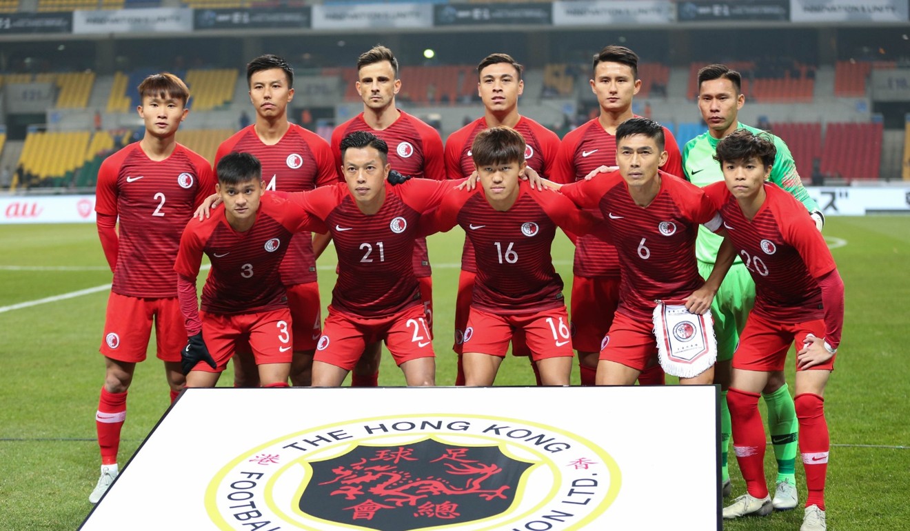 Hong Kong pose for a photo before the start of the match. Photo: HKFA