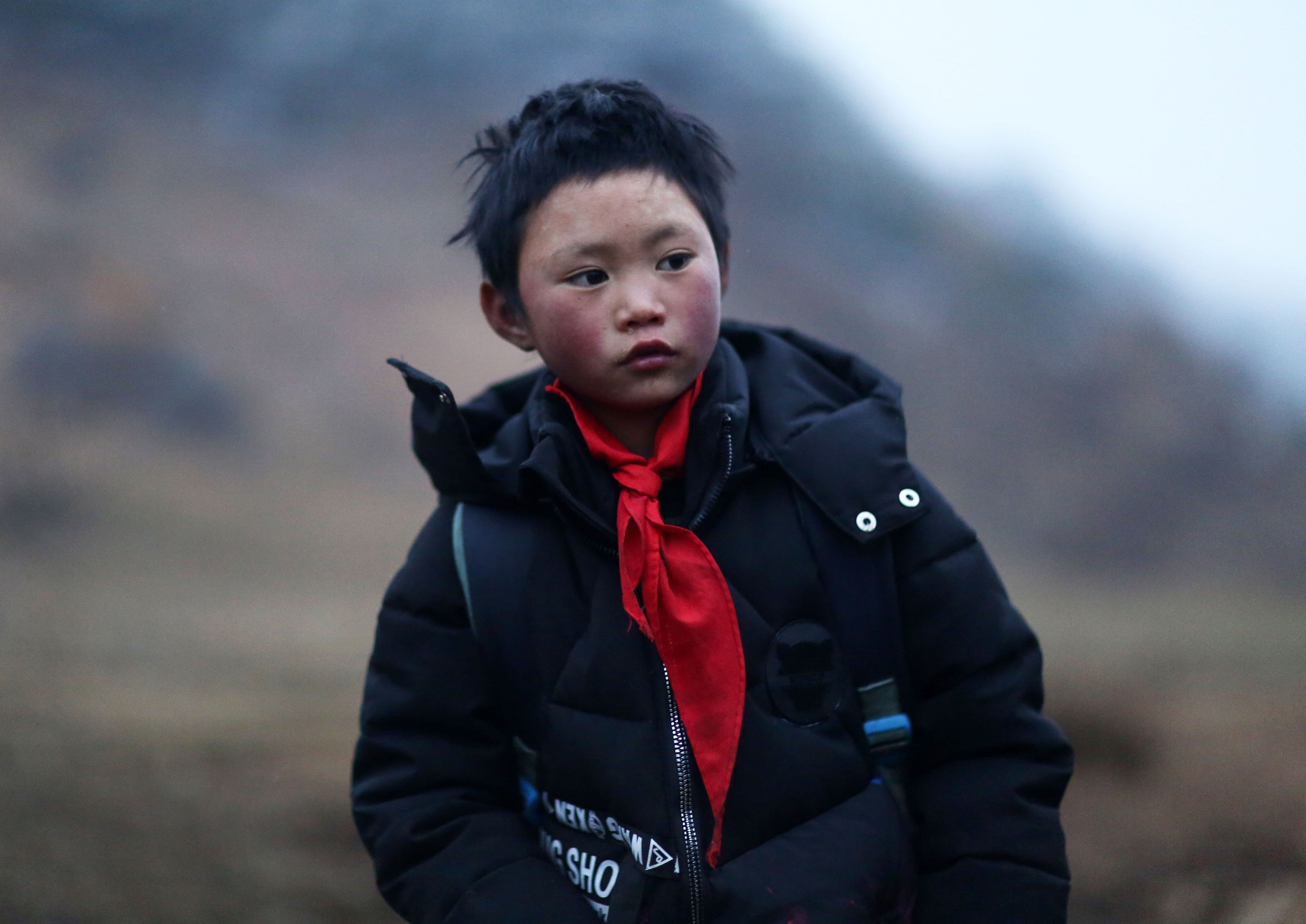 Nine-year-old Wang Fuman’s family has now moved from their mud hut to a two-storey home. Photo: AFP
