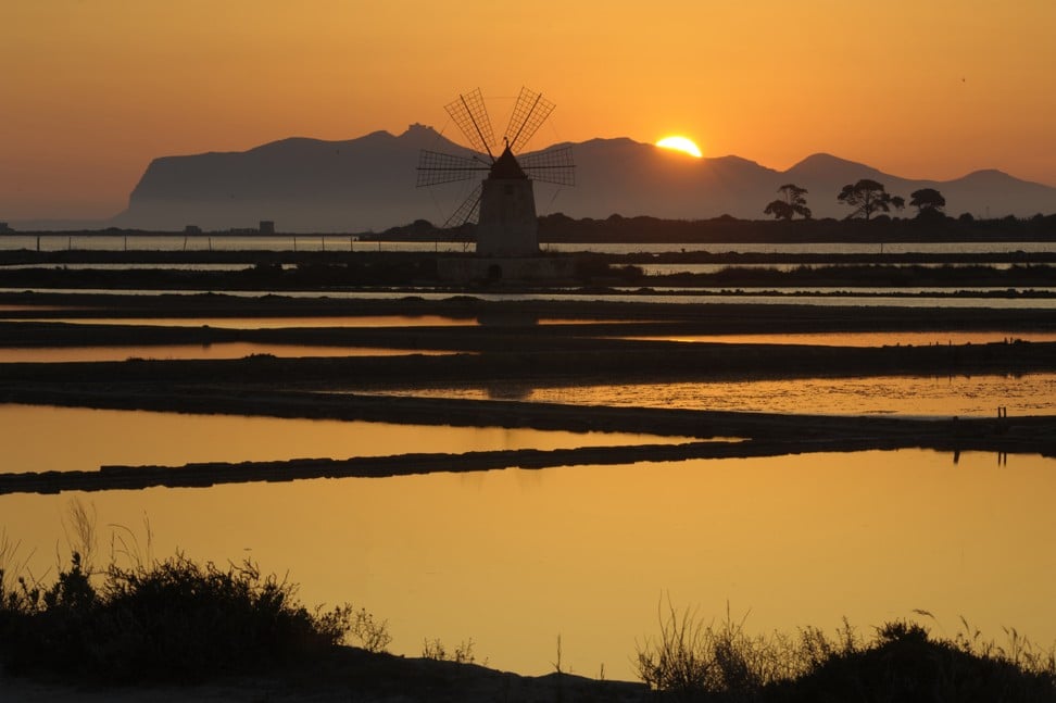 Sunset on the salt flats of Italy’s Stagnone Lagoon, an emerging tourist spot for Chinese travellers. Photo: De Agostini via Getty Images