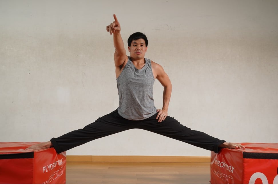 Fitness instructor Teddy Lo goes through a workout at the Trybe gym in Hong Kong.