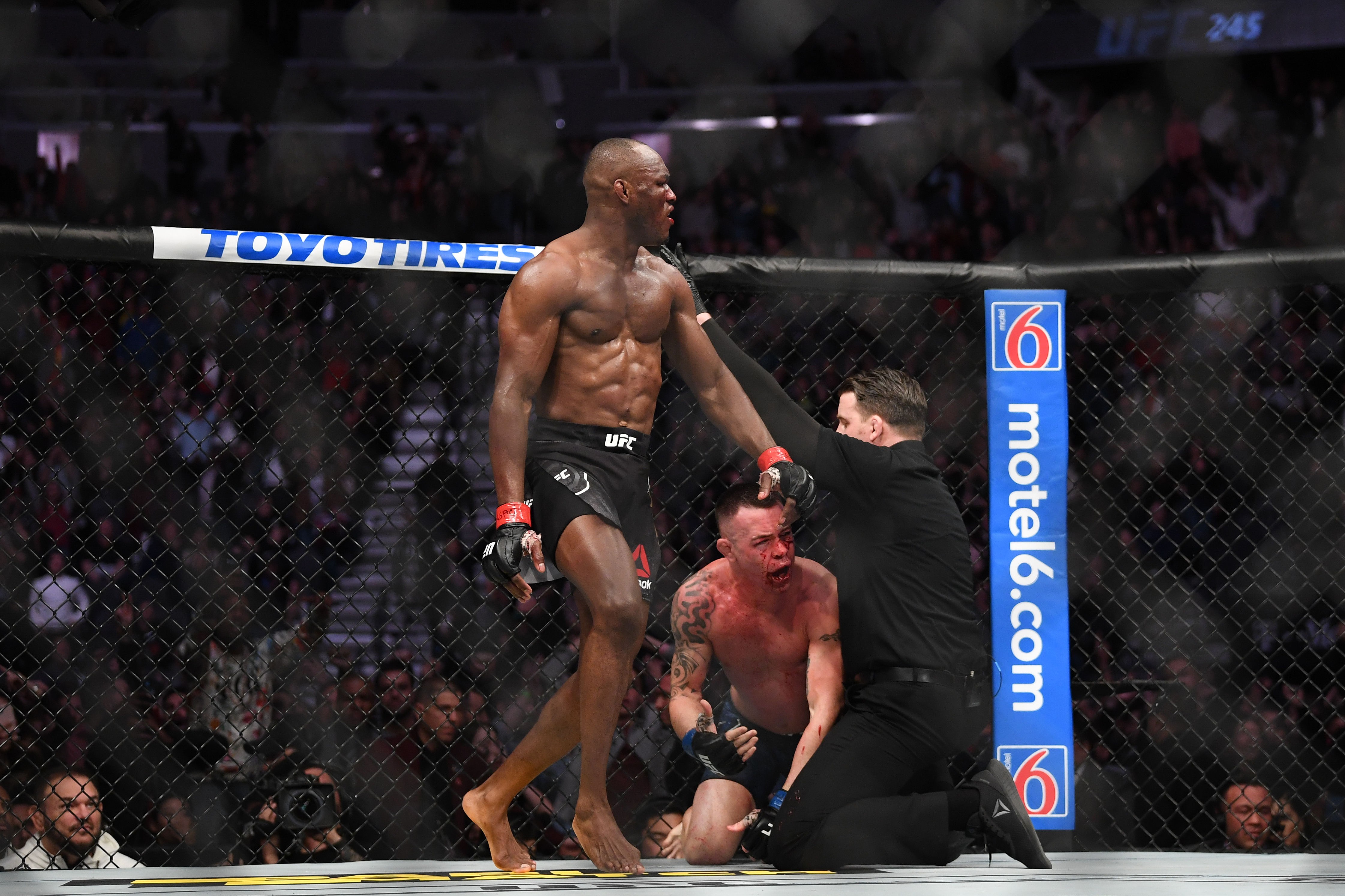 Kamaru Usman walks off as referee Marc Goddard stops his bout against Colby Covington at UFC 245. Photo: USA TODAY Sports
