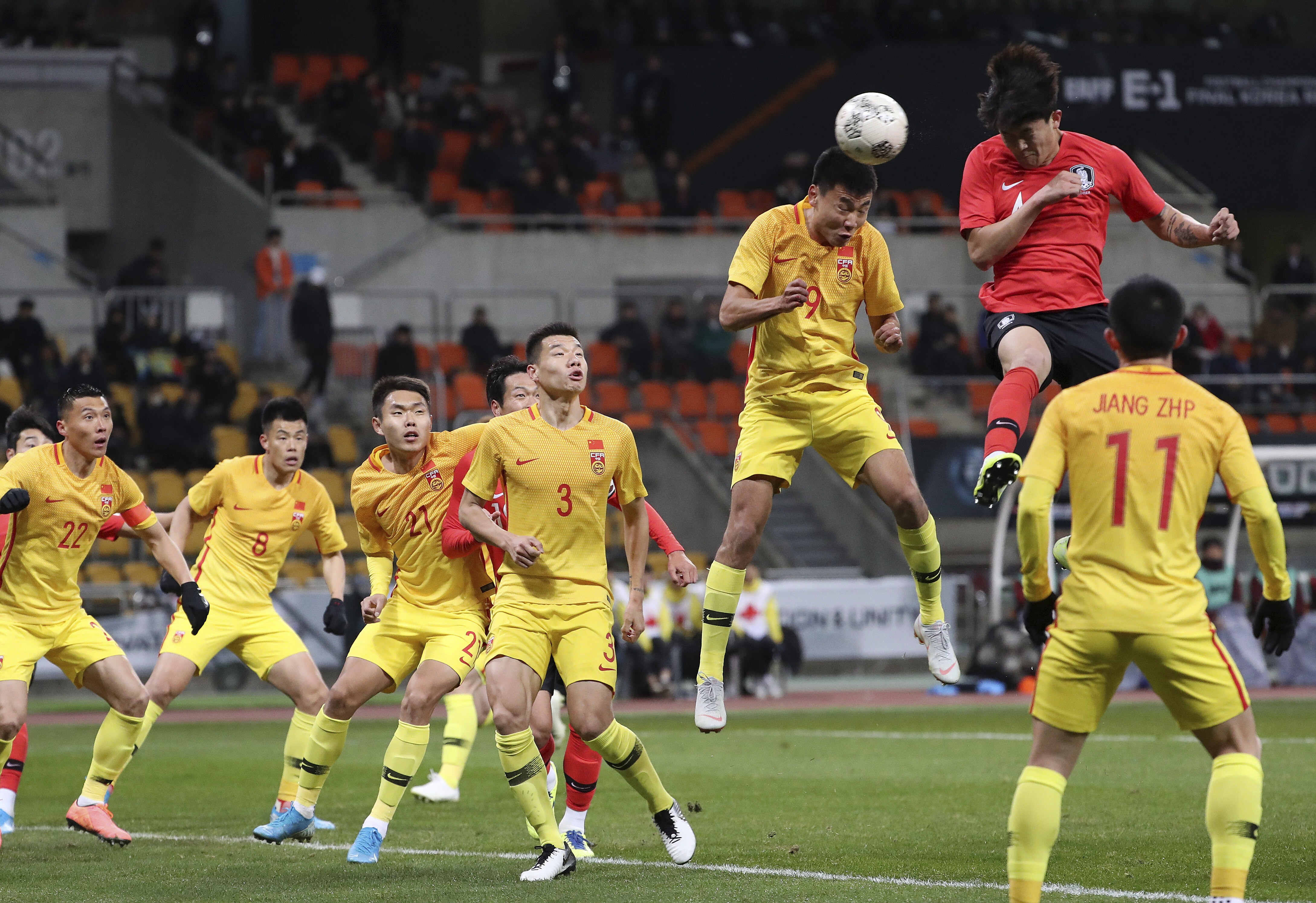 South Korea's Kim Min-jae rises high to score the only goal of the match against China in Busan. Photo: AP