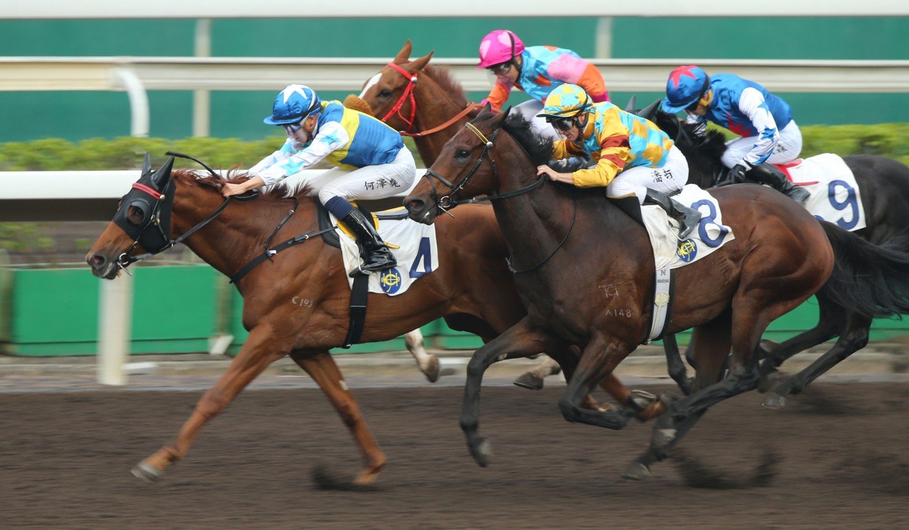 Jockey Vincent Ho punches out Elite Patch at Sha Tin on Sunday.