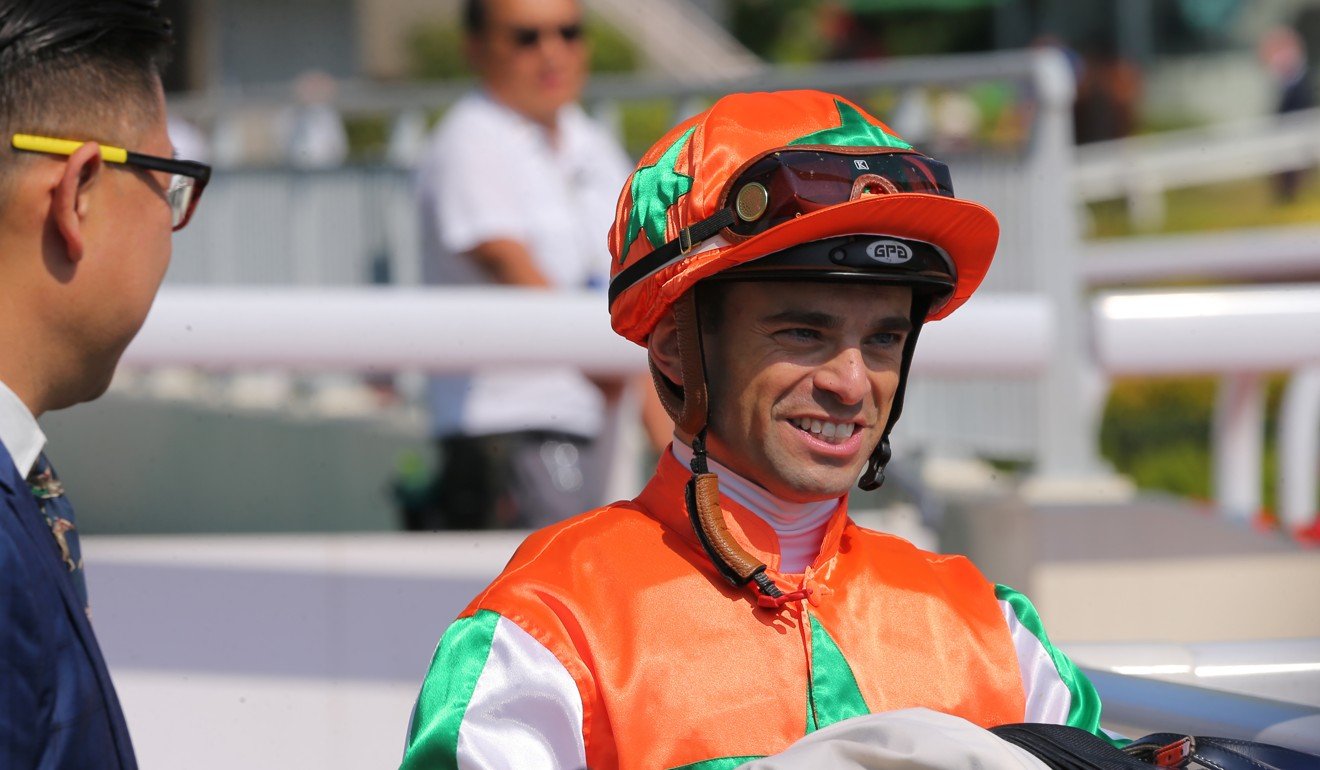 Umberto Rispoli after riding a winner at Sha Tin this season.