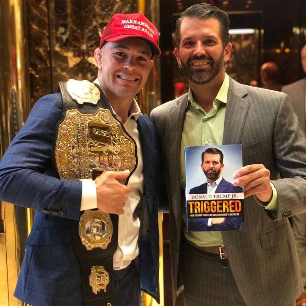 Colby Covington poses with Donald Trump Jnr.
