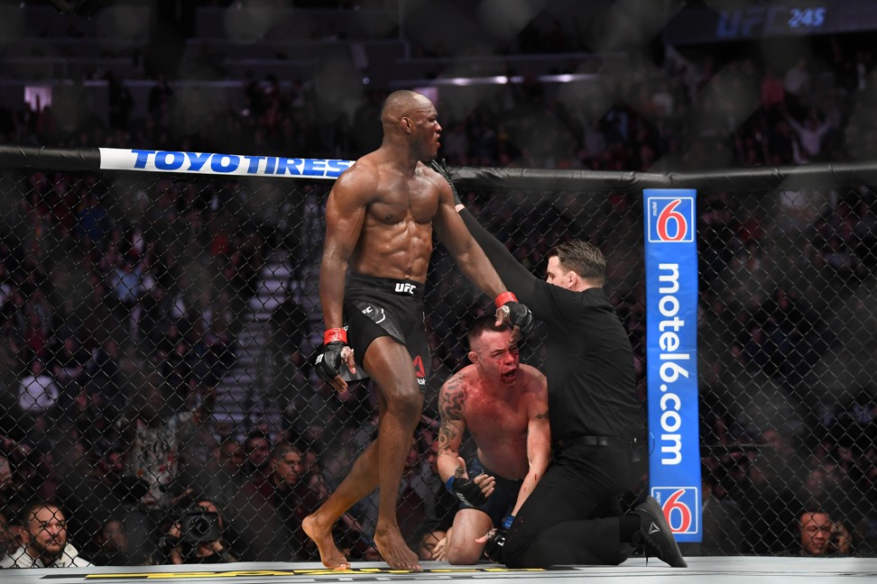 Kamaru Usman reacts as referee Marc Goddard stops his bout against Colby Covington. Photo: USA TODAY Sports