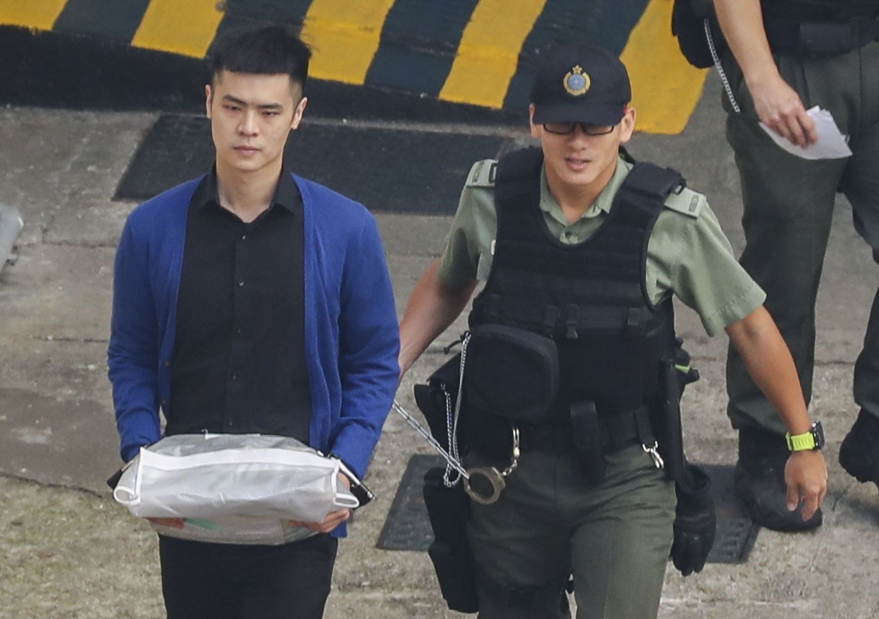 Cheung Sin-hang is escorted away from Lai Chi Kok Detention Centre, as he heads to court for sentencing. Photo: Winson Wong