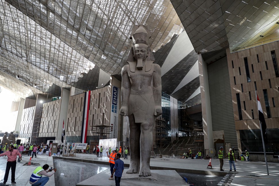 A statue of Pharaoh Ramses II as construction work goes on around it at the newly built Grand Egyptian Museum in Cairo, Egypt. Photo: AFP