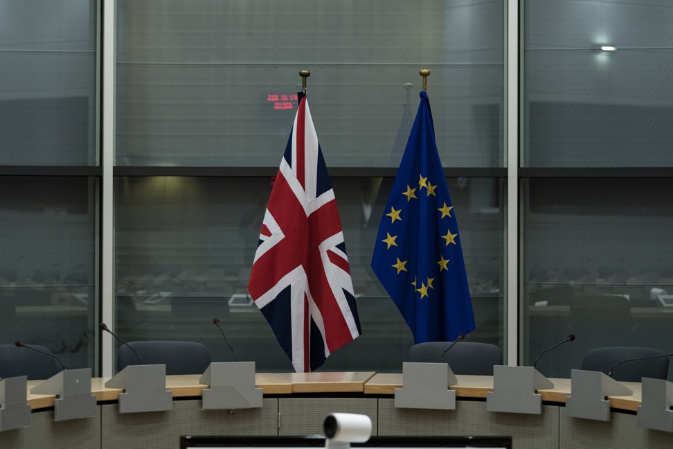 The flags of the United Kingdom and the European Union on display in Brussels, Belgium. Photo: AFP