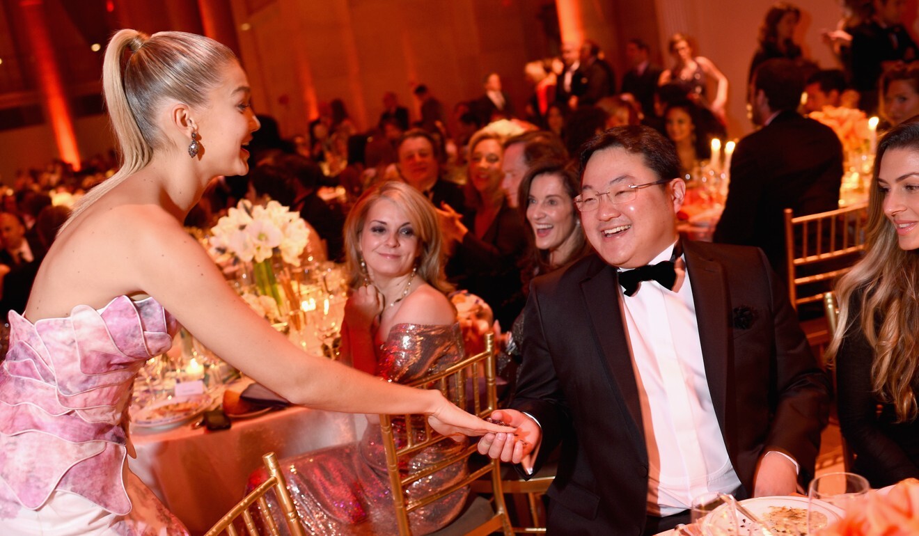 Jho Low is pictured withmodel Gigi Hadid at a ball in New York City in 2014. Photo: AFP