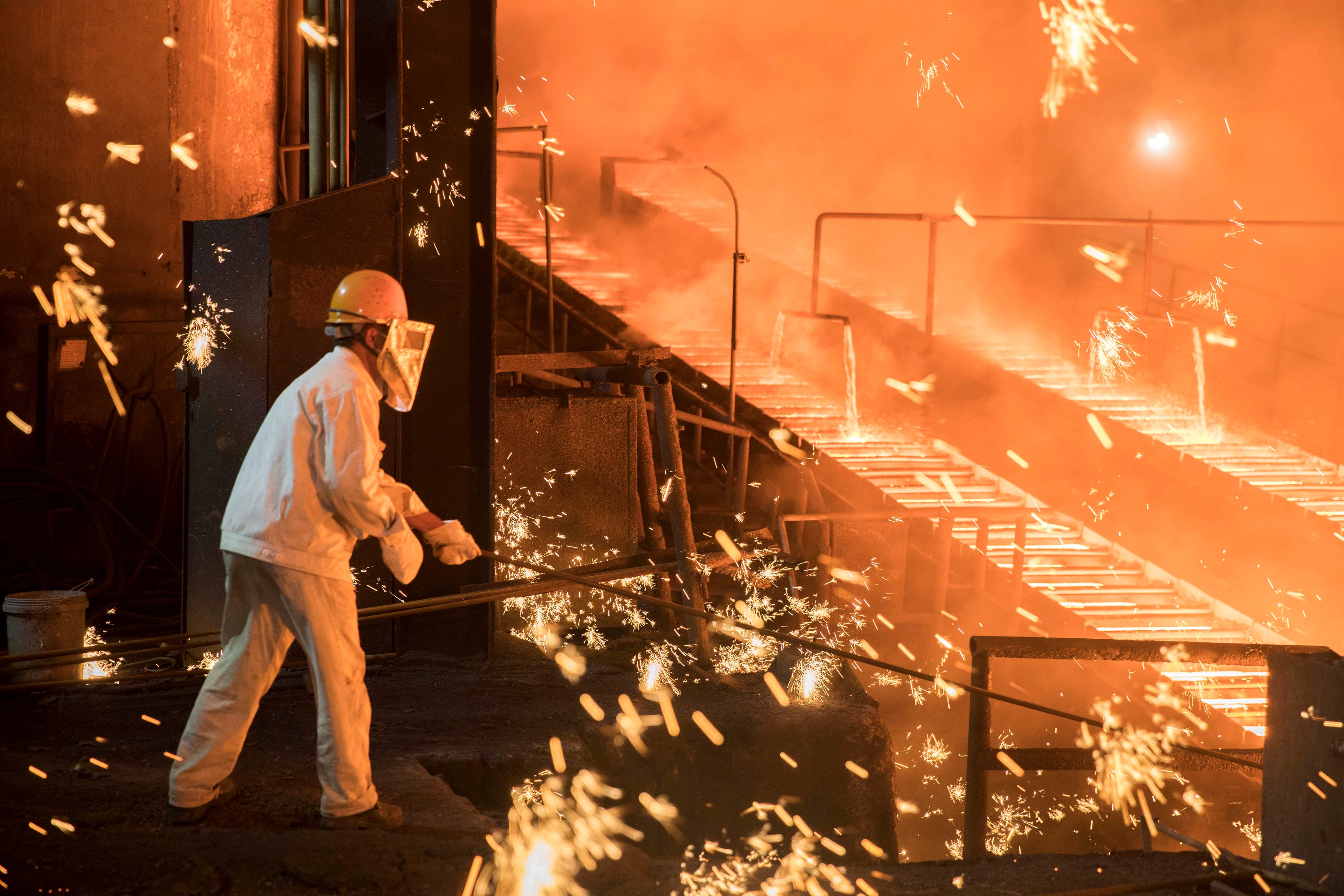 Shandong Iron & Steel Group’s plant in Jinan, Shandong province. Deal making in the metal and steel industry has surged 111 per cent so far this year. Photo: Reuters