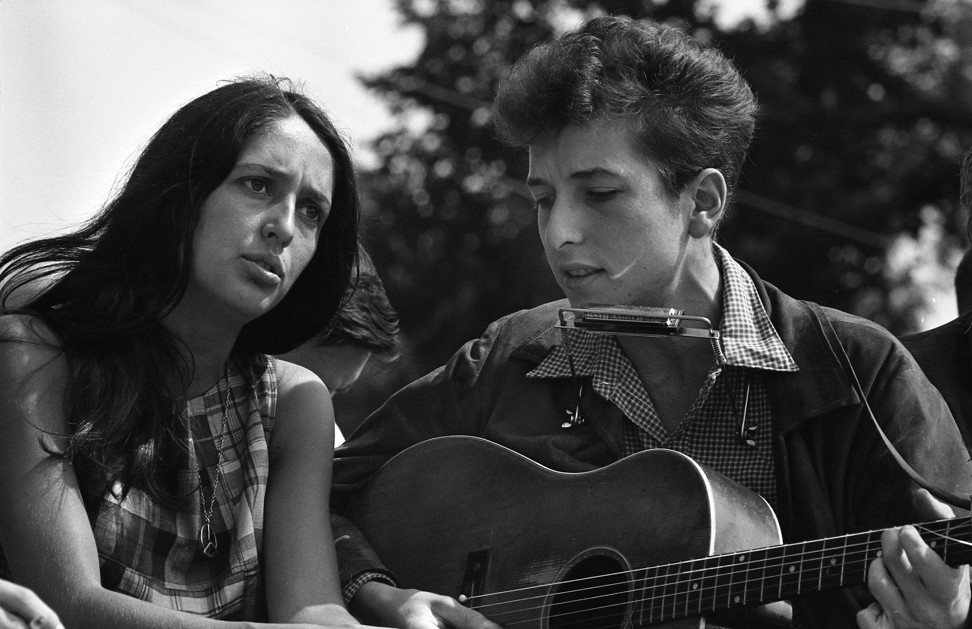 Joan Baez and Bob Dylan perform in Washington DC during a civil rights rally, in 1963. Photo: Getty Images