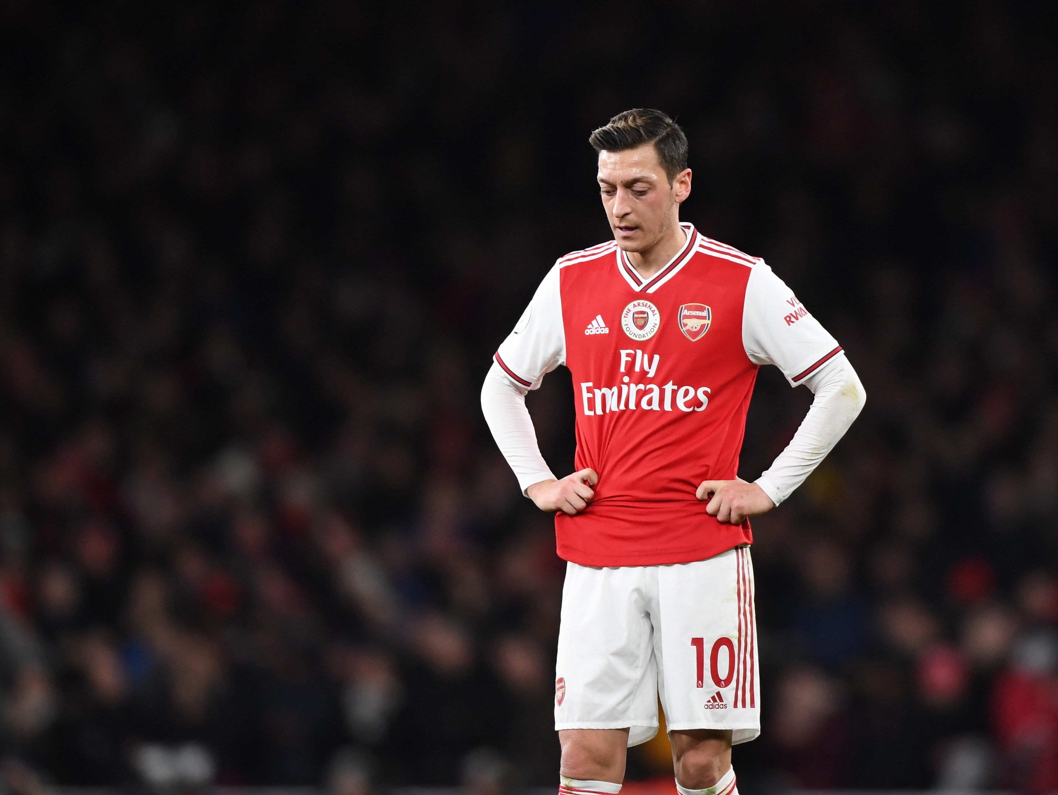 Arsenal's Mesut Ozil takes a breather during the English Premier league soccer match between Arsenal and Manchester City in London on Sunday. Ozil has a new fan in US Secretary of State Mike Pompeo, who has praised his criticism of China concerning its treatment of Uygurs in Xinjiang. Photo: EPA-EFE