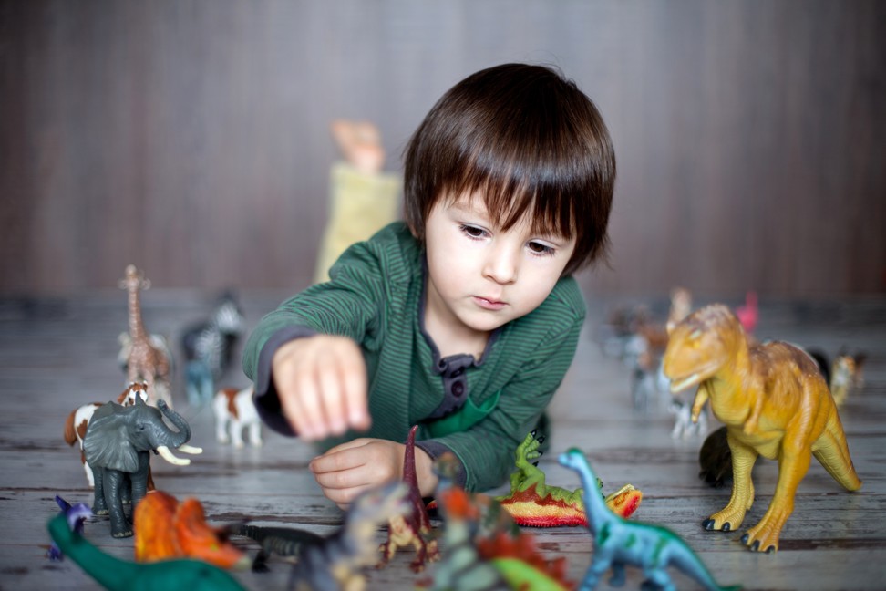 Children with autism may be passionate about specific topics, like dinosaurs. Photo: Shutterstock
