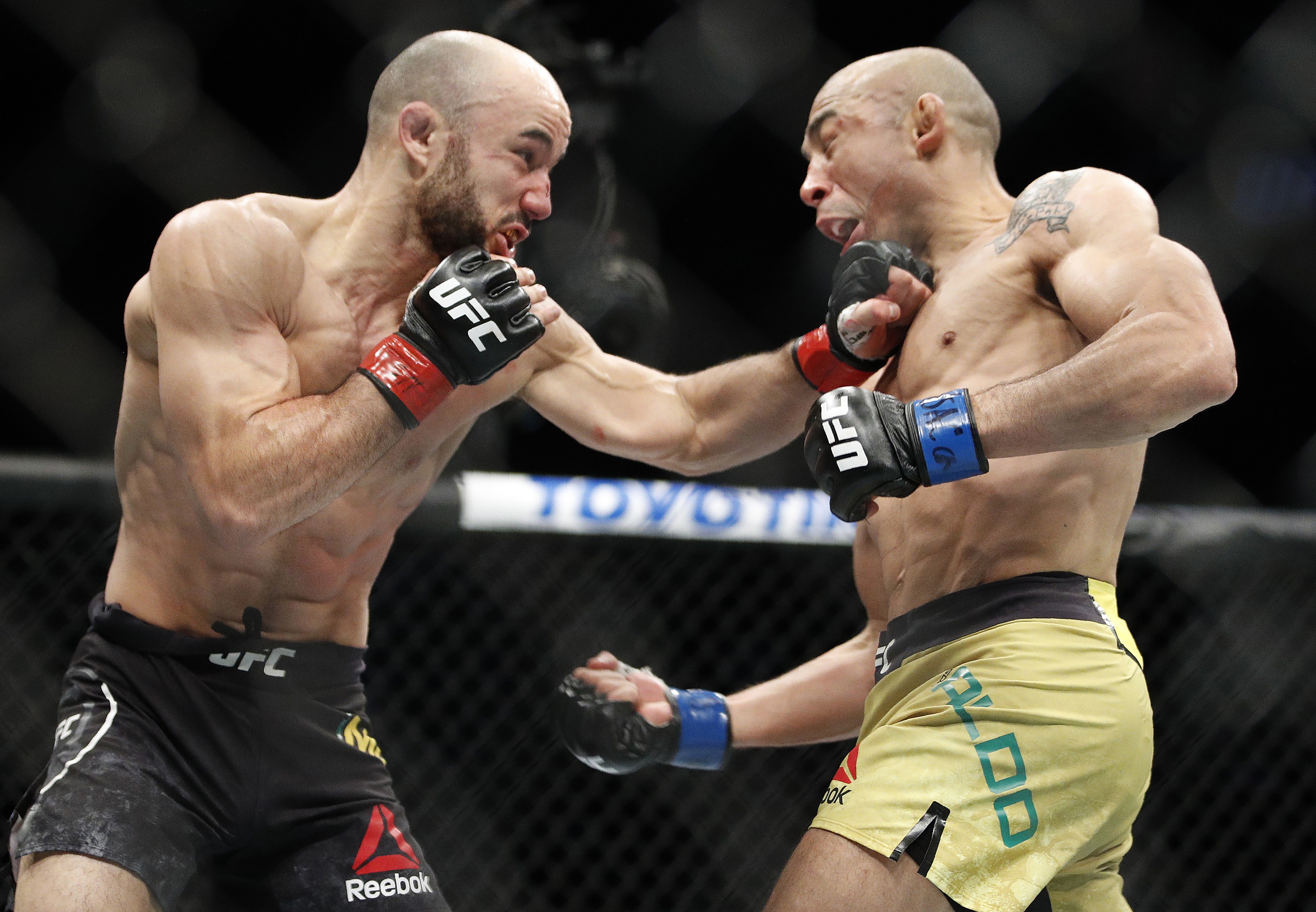 Marlon Moraes hits Jose Aldo at UFC 245. Photo: AP