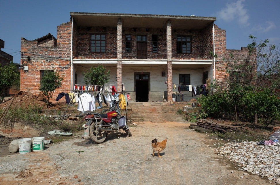 Money made in Shenzhen allowed families in Leiyang County to build bigger homes. Photo: Washington Post photo by Gerry Shih